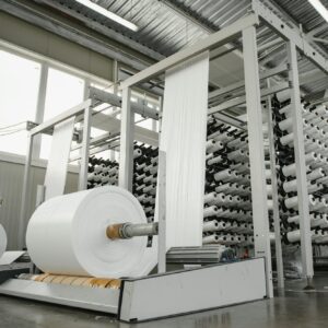 Production of polypropylene yarn for making bags.